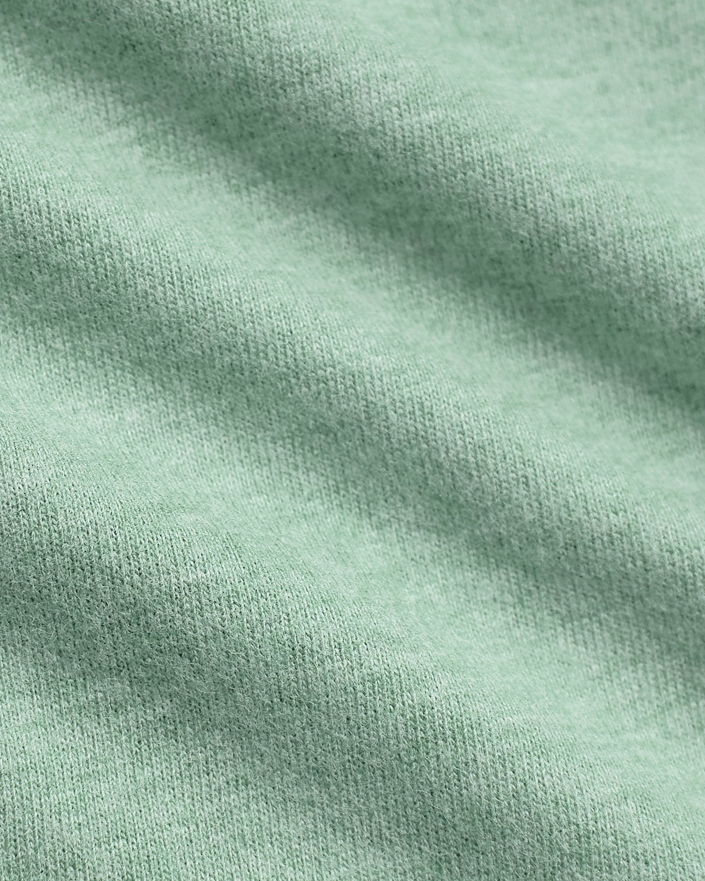 Heather Slate Green Classic V-Neck, showcasing fine knit texture and soft folds.