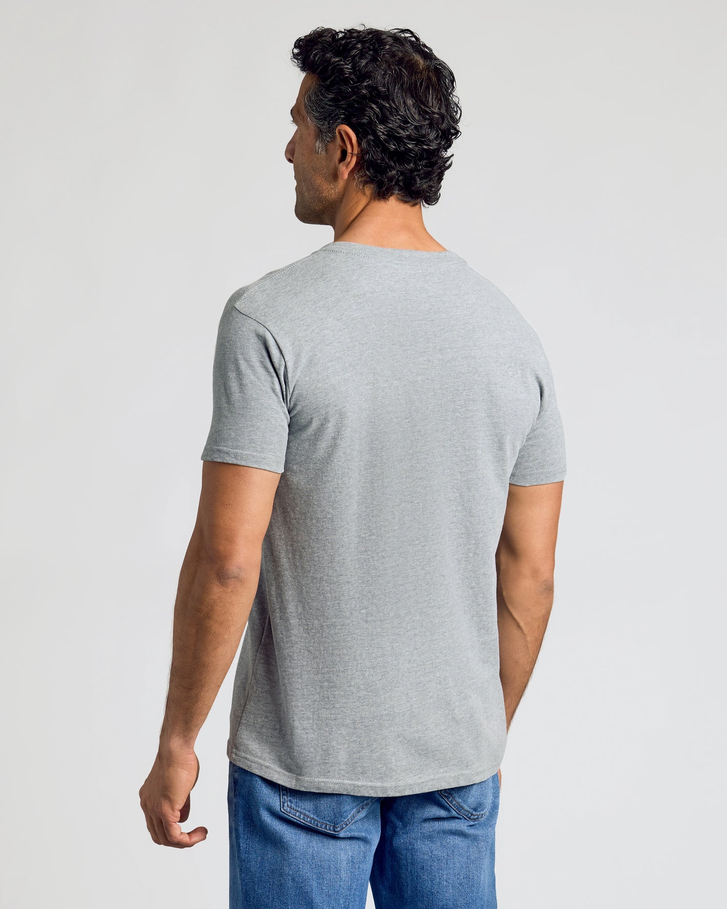 Man wearing Staple Classic V-Neck T-shirt, seen from behind.