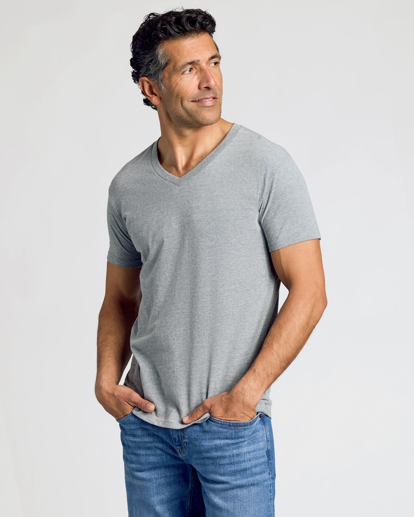 Wardrobe Classic V-Neck 10-Pack shown on man in gray T-shirt.