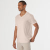 Model wearing Pink Opal V-Neck Tee, relaxed fit.