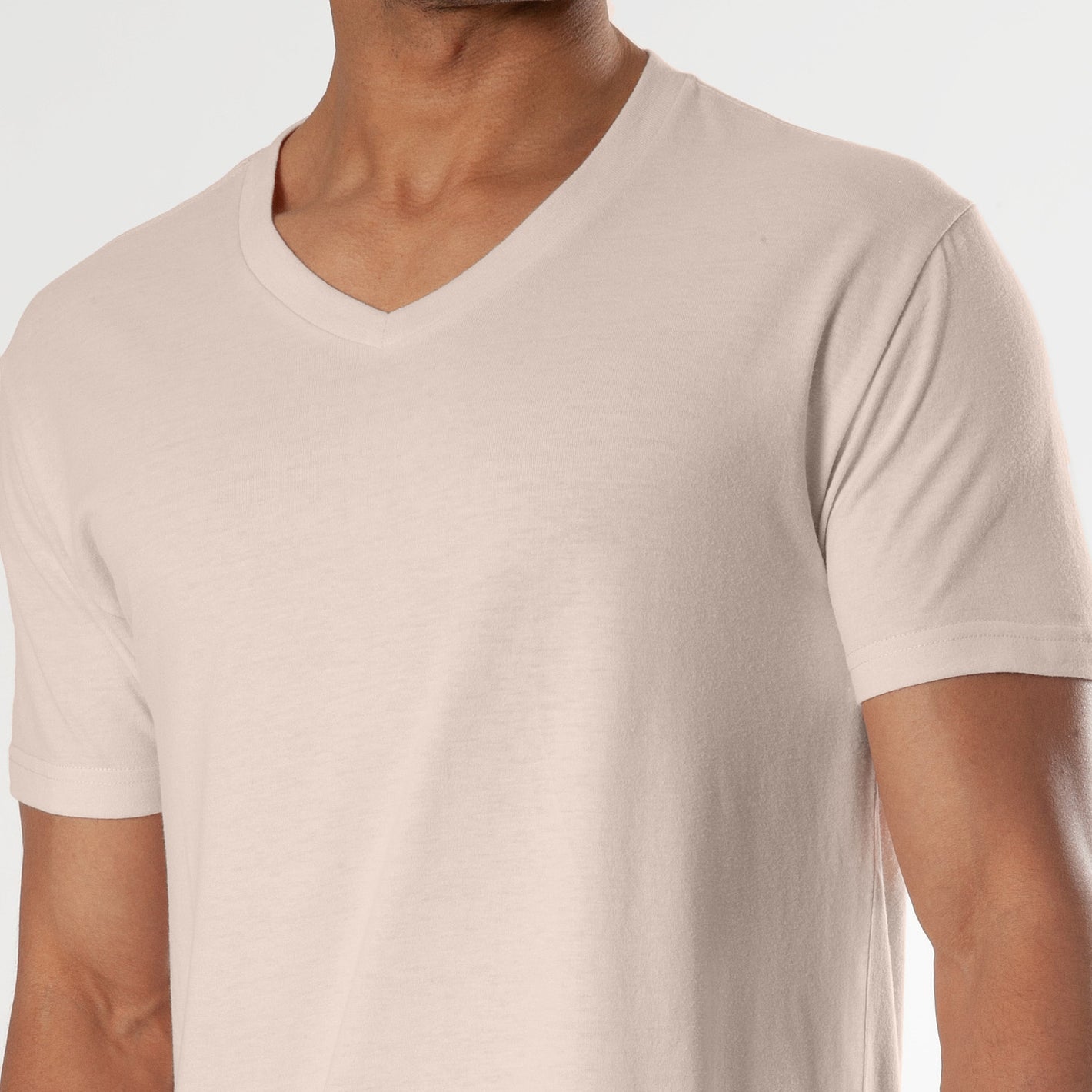 Pink Opal V-Neck Tee on male model, showcasing its fitted contemporary style.