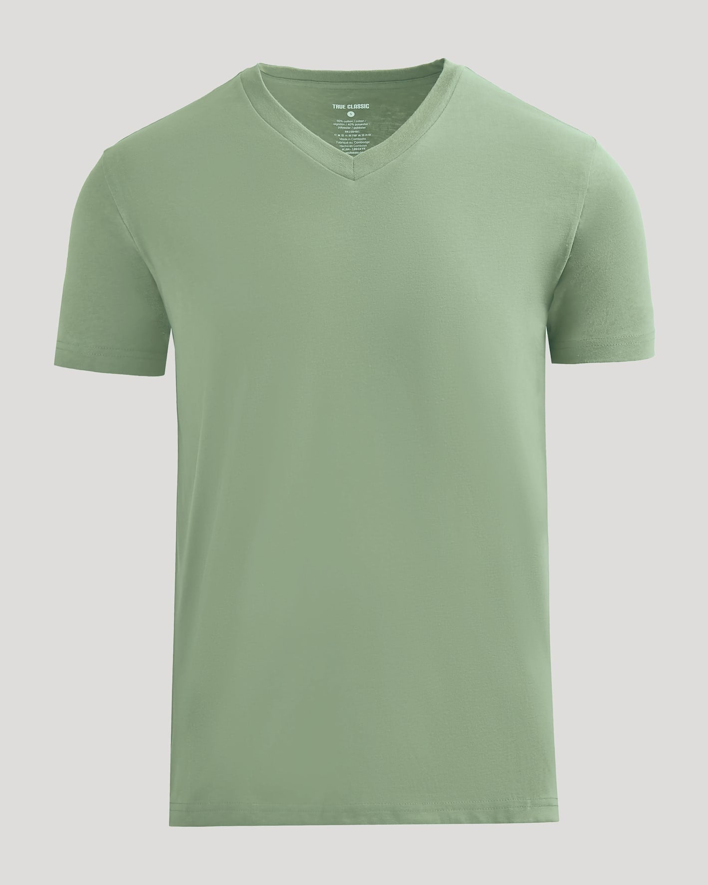 Green t-shirt on a light gray background