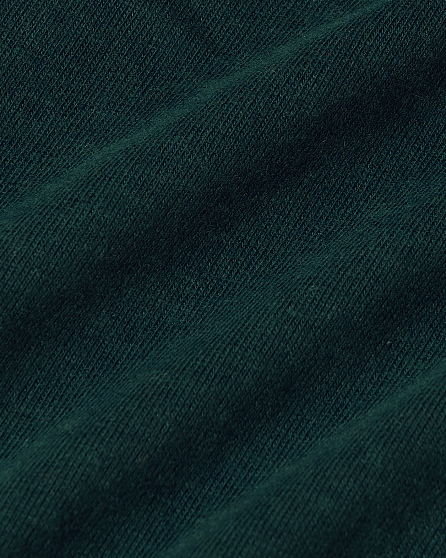 Viridian Classic V-Neck, close-up of soft jersey fabric texture.