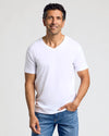 Man wearing All White Classic V-Neck 10-Pack, relaxed stance.