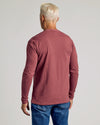 Dark Heather Rustic Apple Classic Long Sleeve Crew Neck, worn by person.