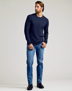 True ClassicMan wearing Staple Crew Neck Sweater 3-Pack, jeans, black boots.