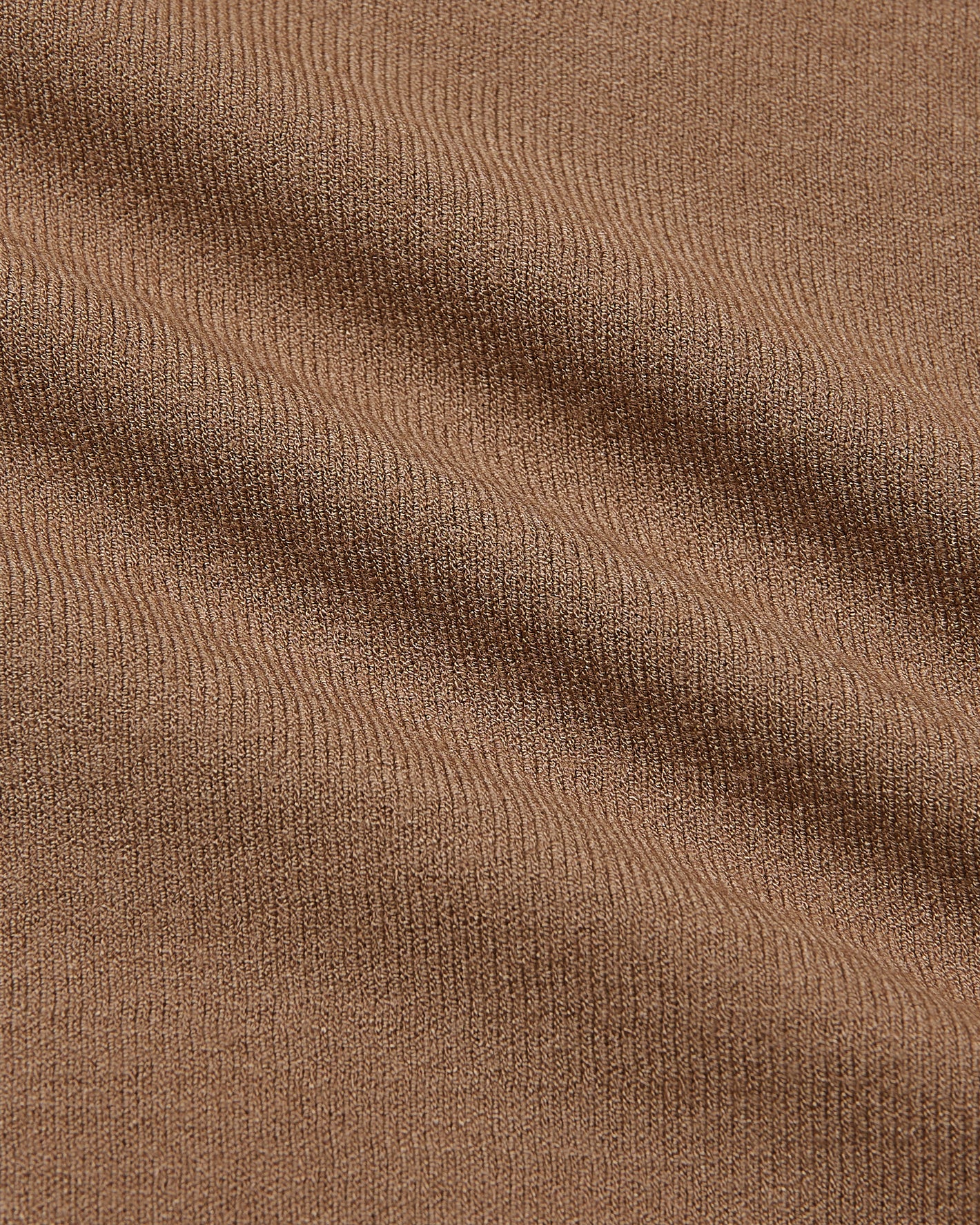 Truffle Dressy Crew Neck Sweater's ribbed knit texture close-up.