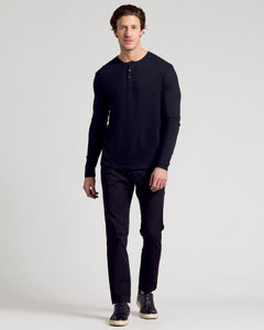 True ClassicMan wearing All Black Classic Henley 6-Pack with trousers and sneakers.
