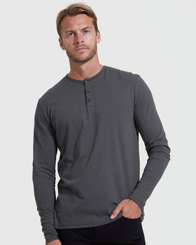 Man wearing The Timeless Classic Long Sleeve Henley in charcoal-gray.