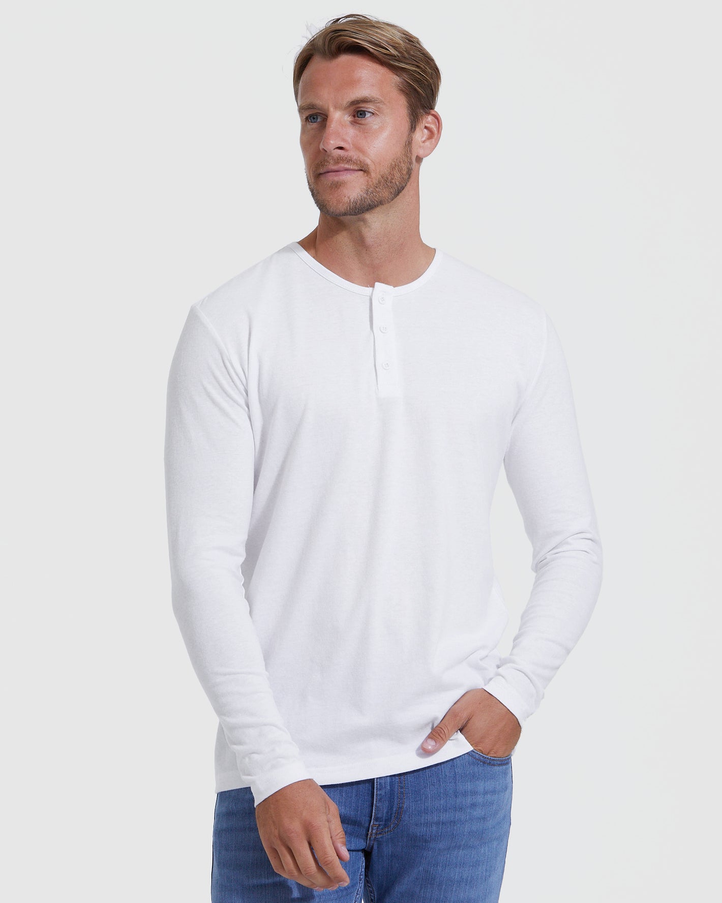 Model wears All White Classic Henley 3-Pack with blue jeans.