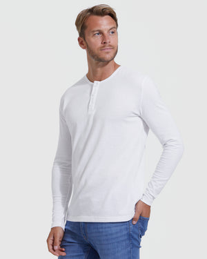 White Classic Long Sleeve Henley worn by man with blue jeans.