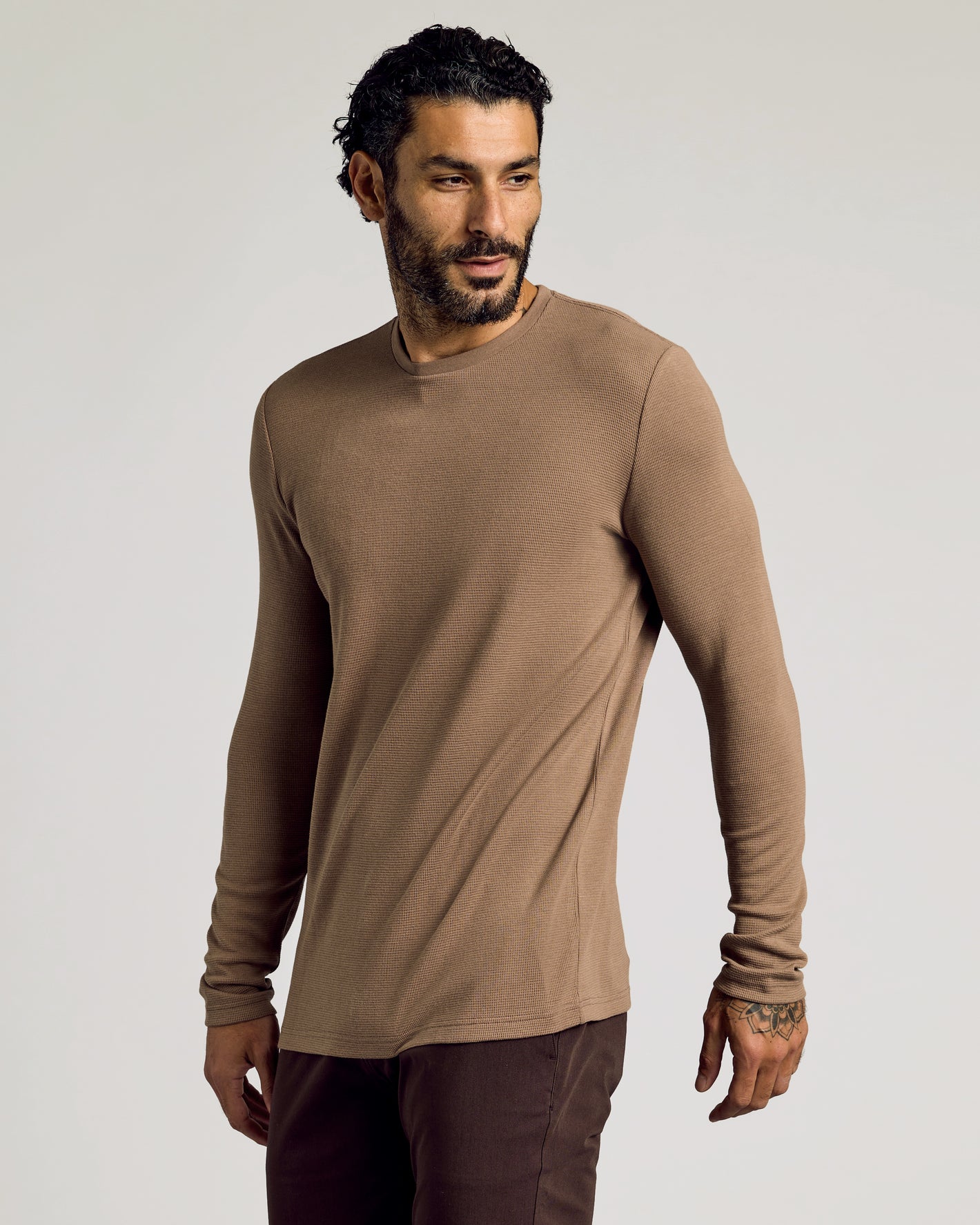 Alpaca Waffle Long Sleeve Crew Neck, worn by male model with tattoo.