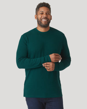 Man wearing Evergreen Heather Waffle Long Sleeve Crew Neck, smiling.