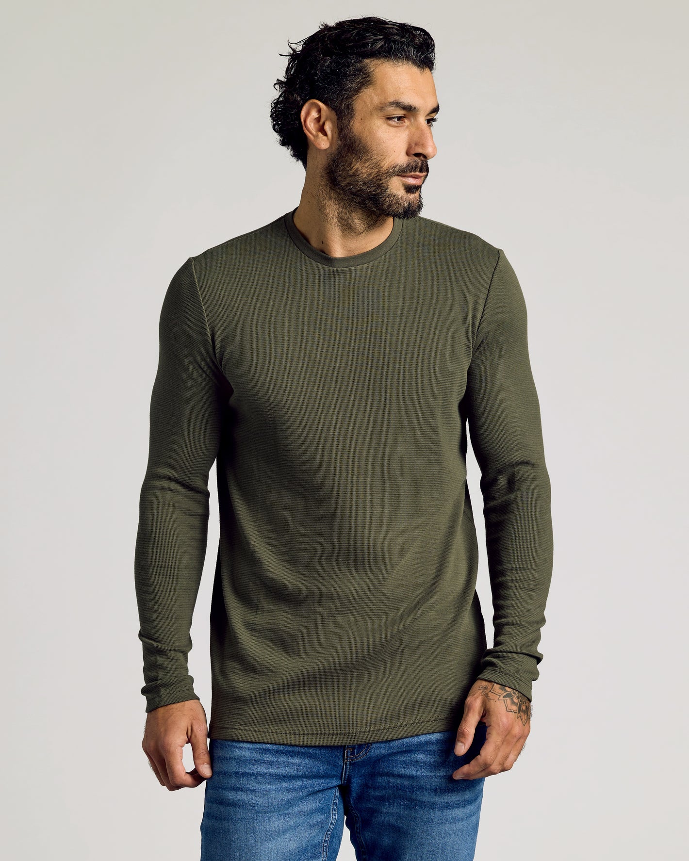 Model wearing Kelp Waffle Long Sleeve Crew Neck with jeans.