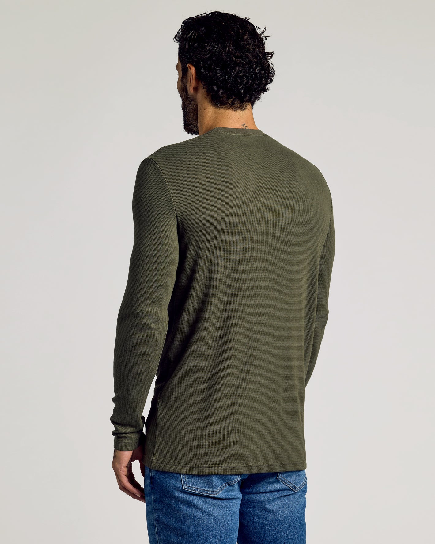 Man wearing Kelp Waffle Long Sleeve Crew Neck, showcasing back and texture.