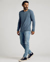 Model in Fiord Waffle Long Sleeve Henley with jeans and sneakers.