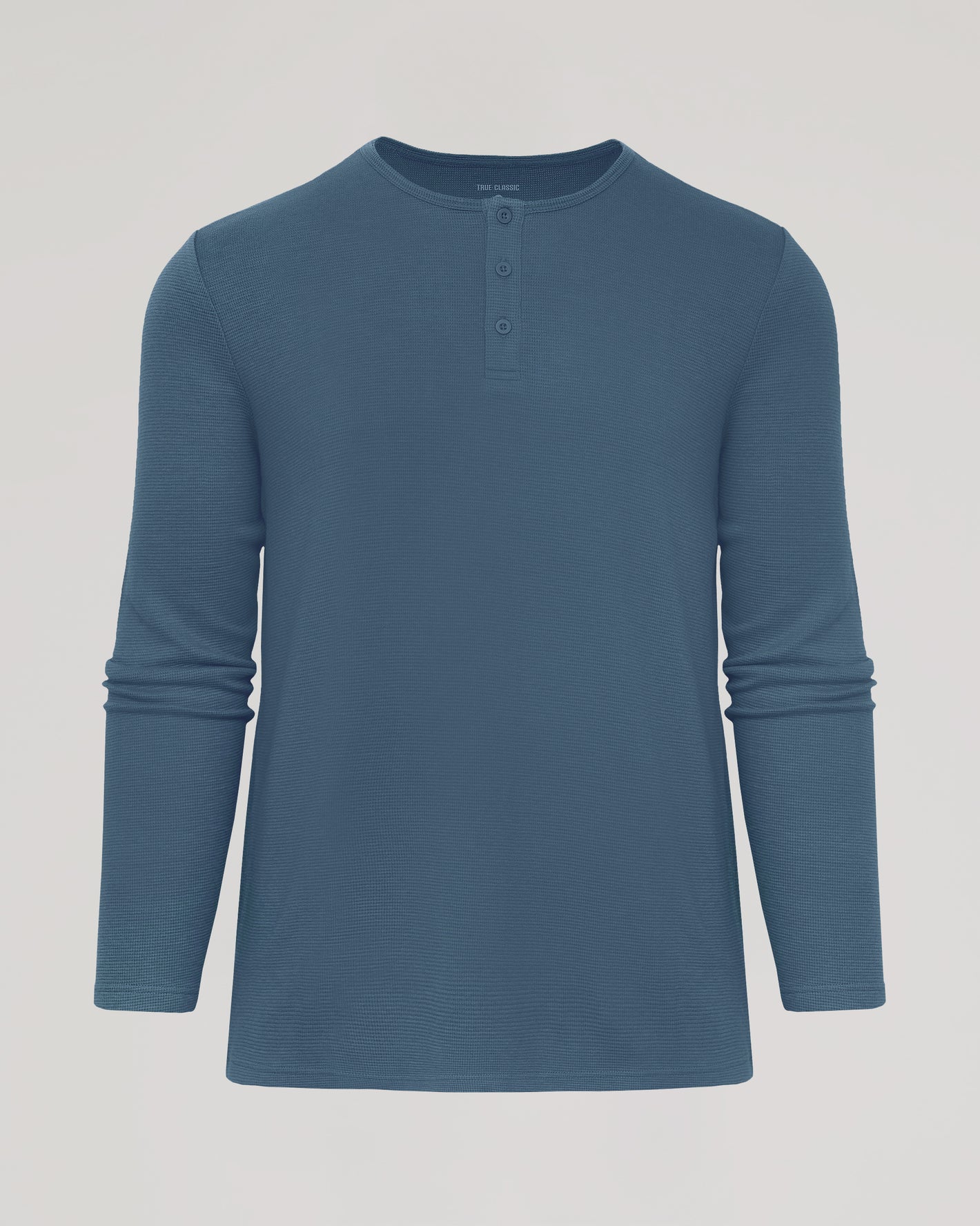 Fiord Waffle Long Sleeve Henley with a textured thermal fabric.