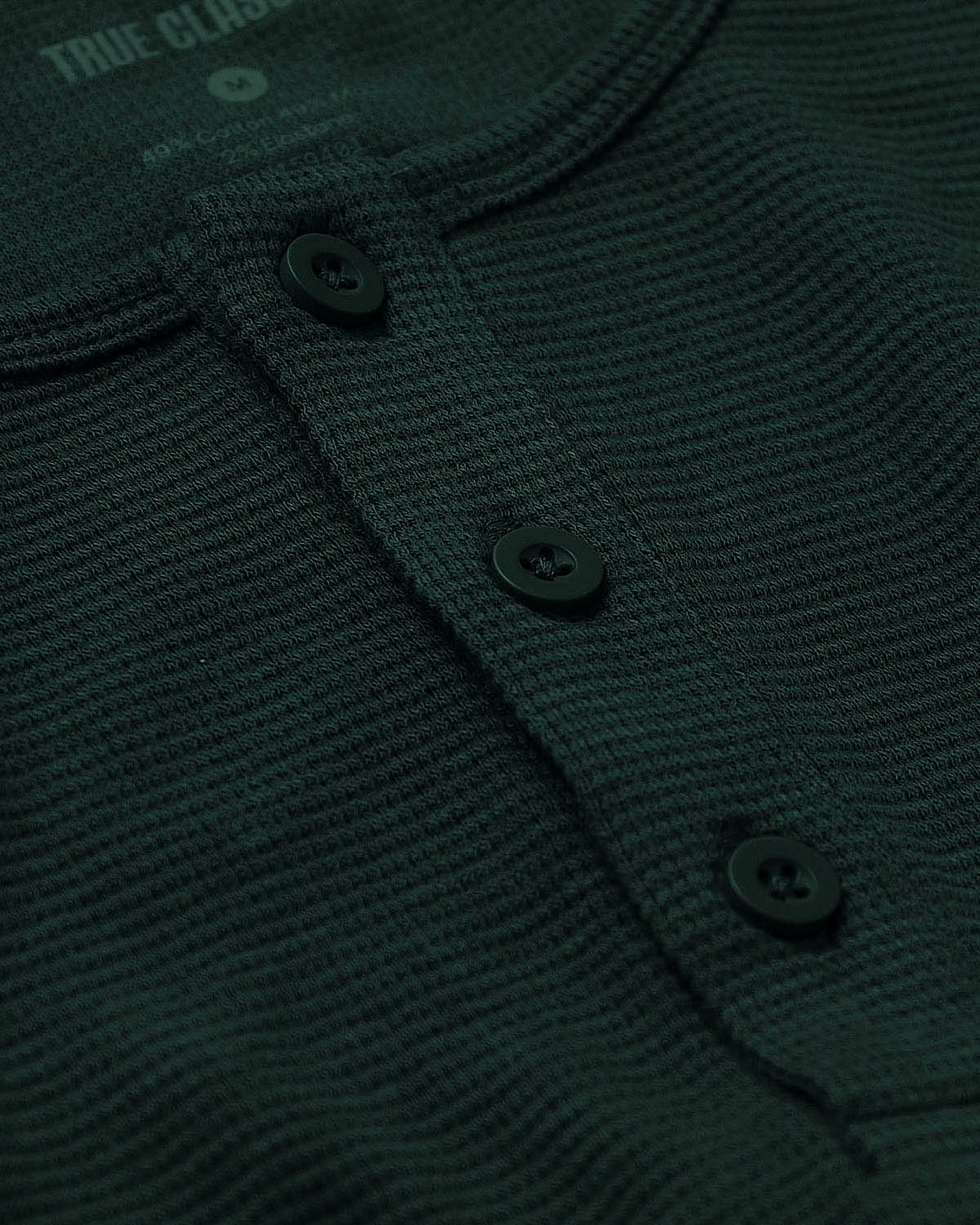 Kale Waffle Long Sleeve Henley, textured knit with button placket.