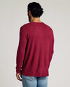 Man wearing Pinot Waffle Long Sleeve Henley with light-wash jeans.