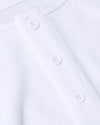 White Waffle Long Sleeve Henley with three-button placket detail.
