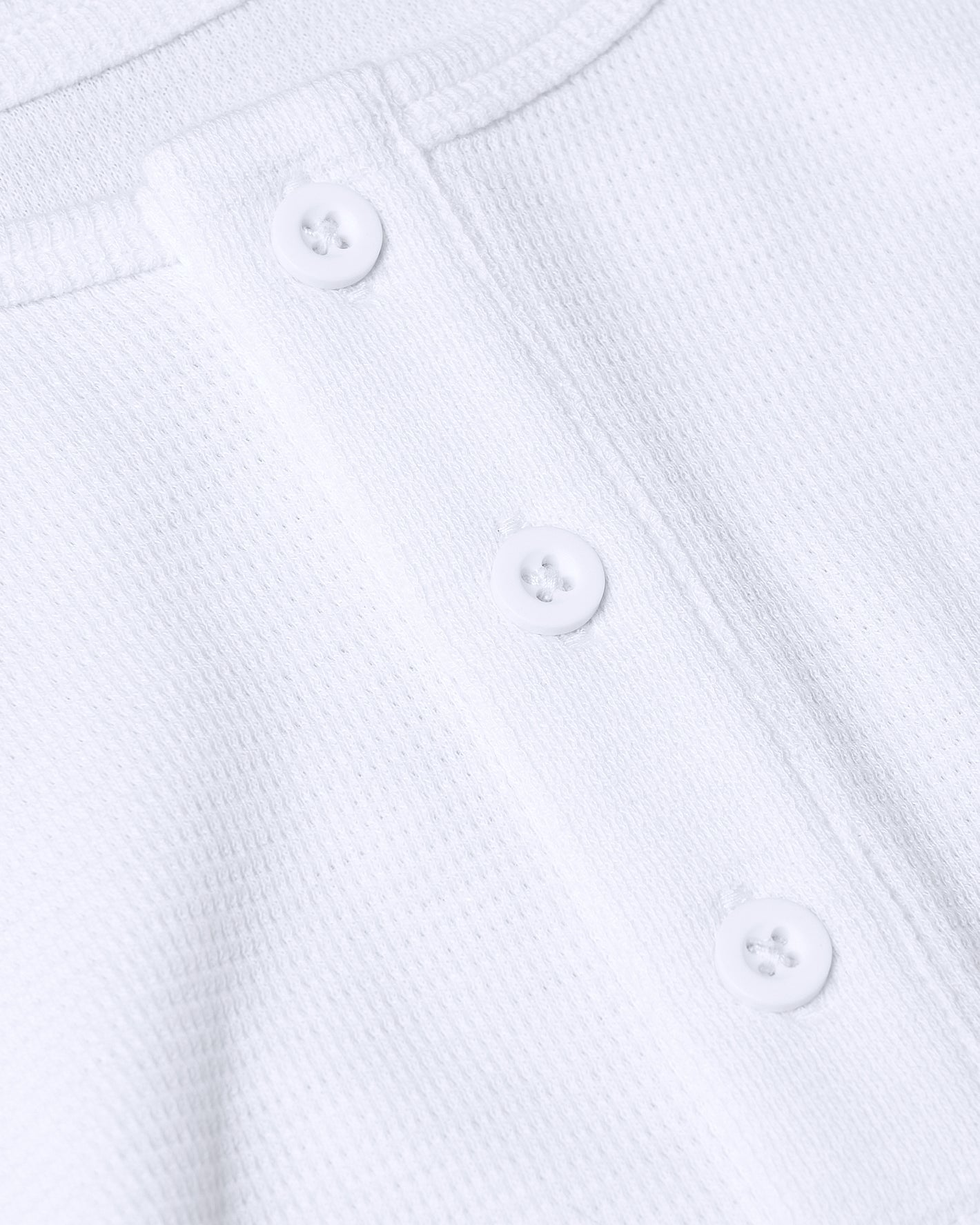 White Waffle Long Sleeve Henley 3-Pack with textured fabric and button placket.