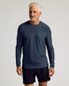 Man wearing Dark Heather Fiord Active Long Sleeve Crew T-Shirt.