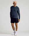 Middle-aged man wears Dark Heather Fiord Active Long Sleeve Crew T-Shirt.