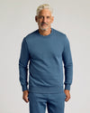 Man wearing Fiord Fleece French Terry Pullover Crew Neck Sweatshirt.