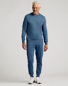 Older man wearing Fiord Fleece French Terry Pullover Crew Neck Sweatshirt.