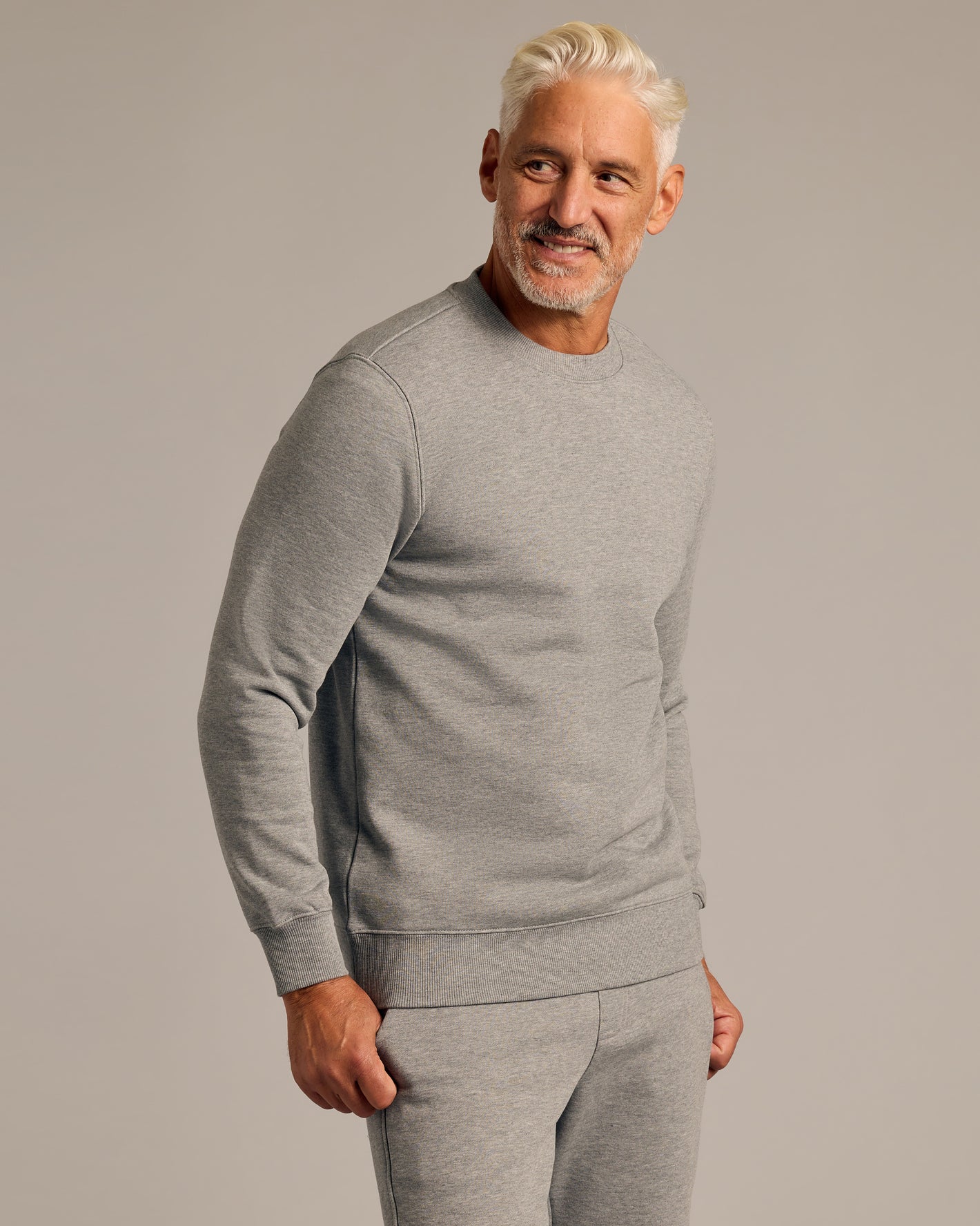 Middle-aged man wearing Dark Heather Gray Fleece French Terry Pullover Crew Neck.