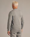 Person in back view wearing Dark Heather Gray Fleece French Terry Pullover Crew Neck.