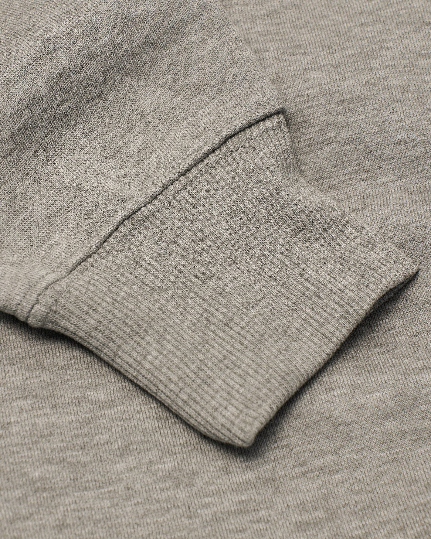 Close-up of Dark Heather Gray Fleece French Terry Pullover Crew Neck cuff.