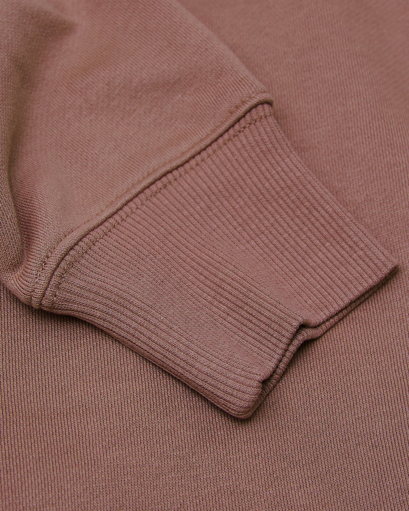 Ribbed cuff of Slate Mauve Fleece French Terry Pullover.