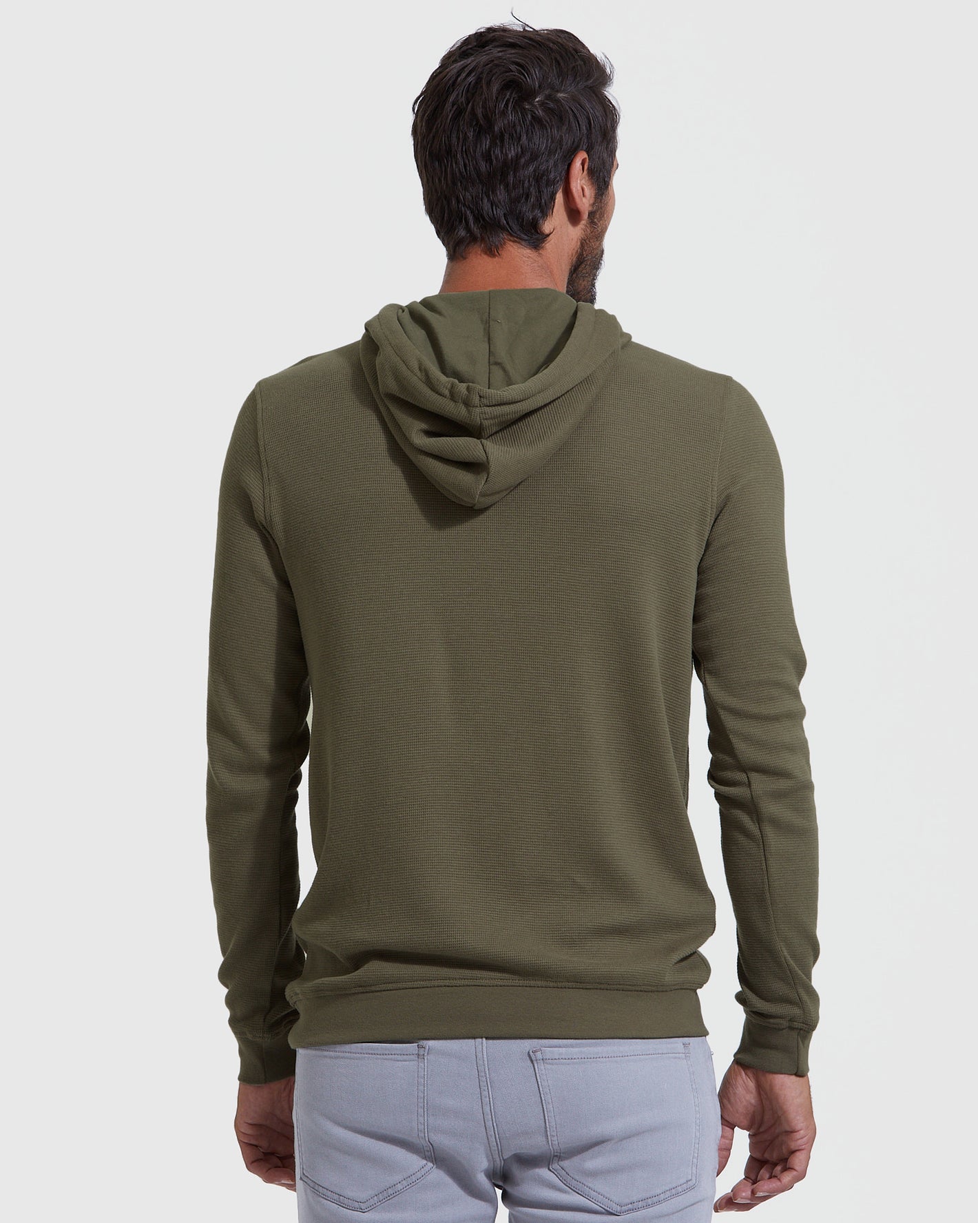 Back view of man in Black & Military Green Waffle Hoodie.