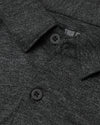 Close-up of Long Sleeve Do-It-All Comfort Shirt showing collar, button, and knit texture.