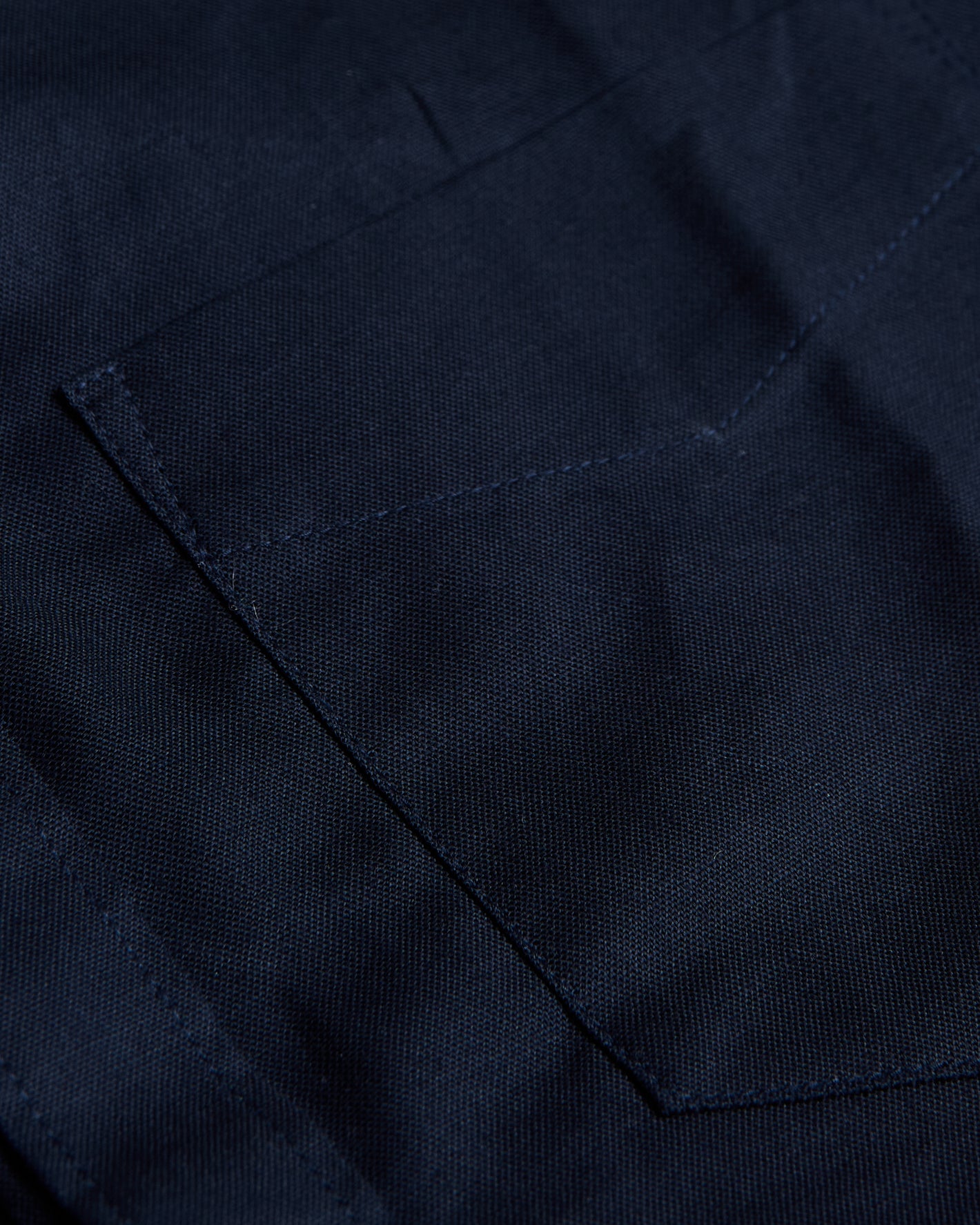 Navy Stretch Oxford shirt with stitched patch pocket detail.