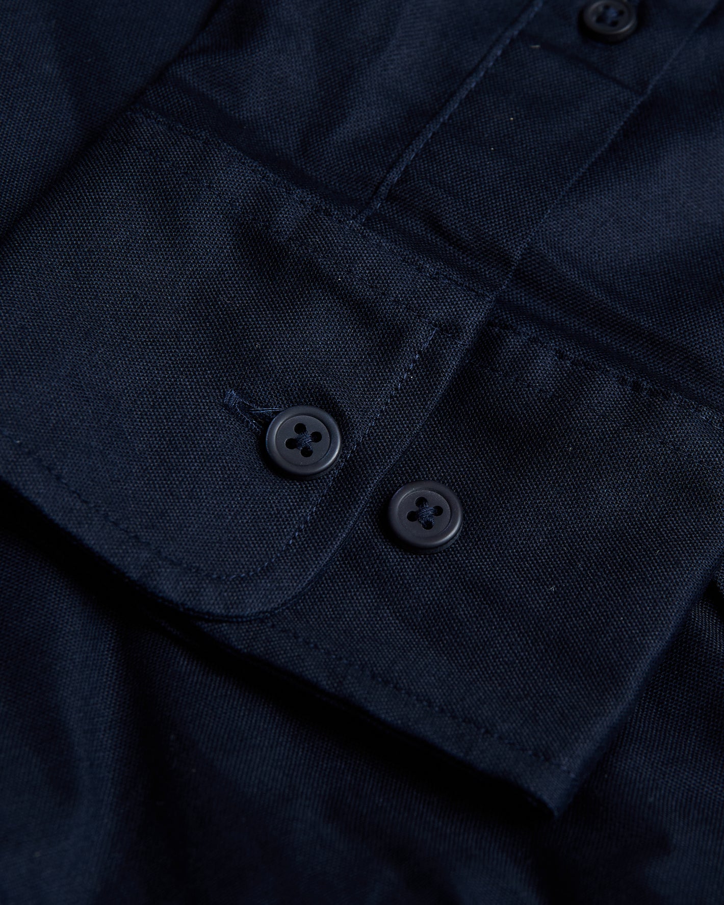 Navy Stretch Oxford Shirt with flap pocket and buttons.