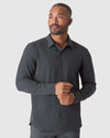The Refined Ripstop Look: model in charcoal button-down shirt.