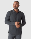 Man in Charcoal & Heather Navy Ripstop Long Sleeve Commuter Shirt.