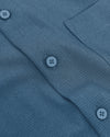 Fiord Long Sleeve Ripstop Commuter Shirt close-up, showing textured fabric, buttons.