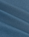 Fiord Long Sleeve Ripstop Commuter Shirt's blue fabric close-up, showing texture.