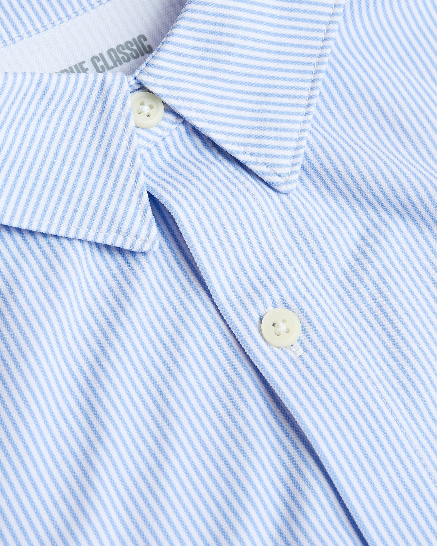 Blue Stripe Stretch Oxford 2.0 shirt collar with seersucker texture.