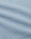 Blue Stretch Oxford 2.0 fabric close-up, showcasing its detailed weave.