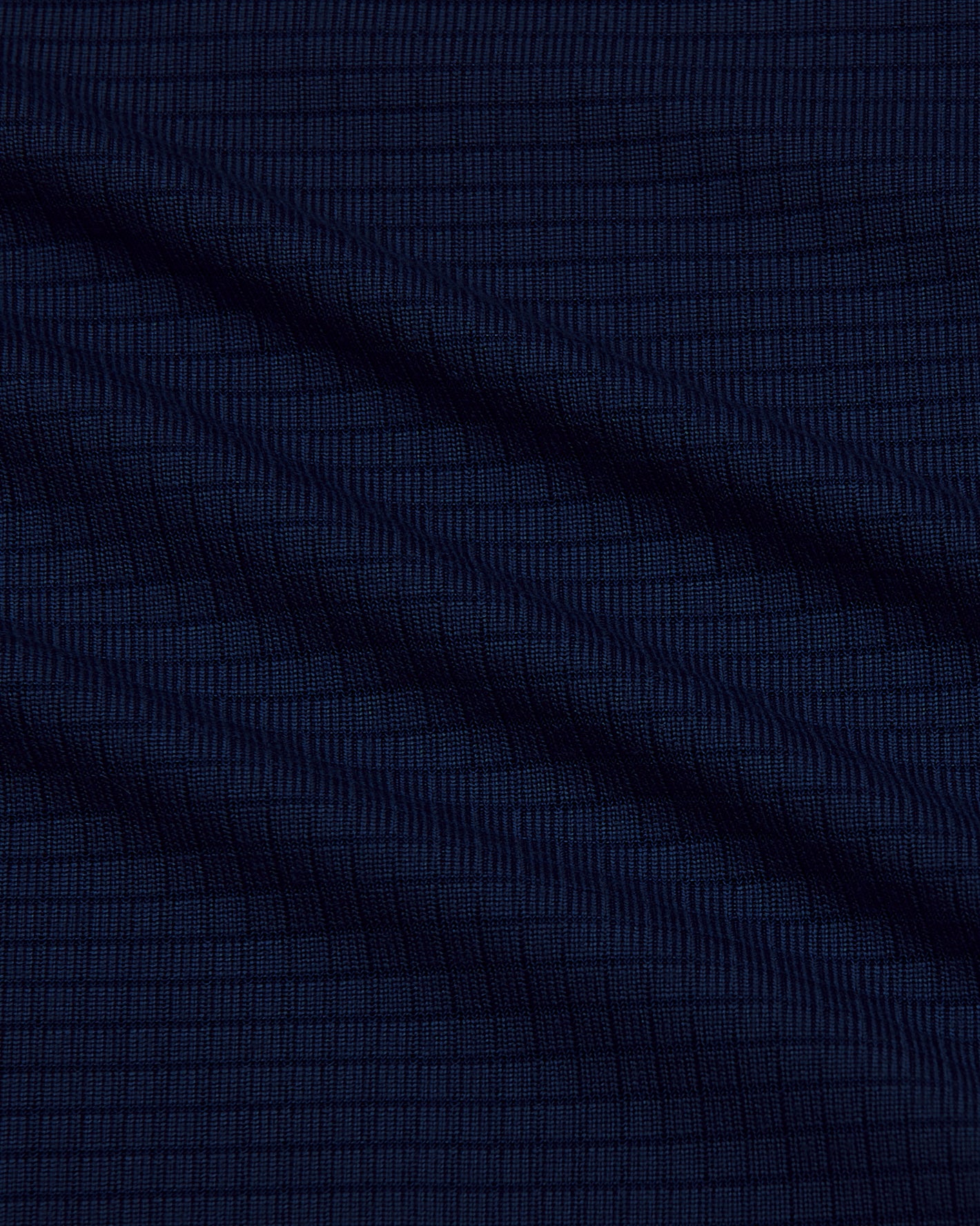 Navy Long Sleeve Active Mesh Crew with textured fabric and gentle draping.