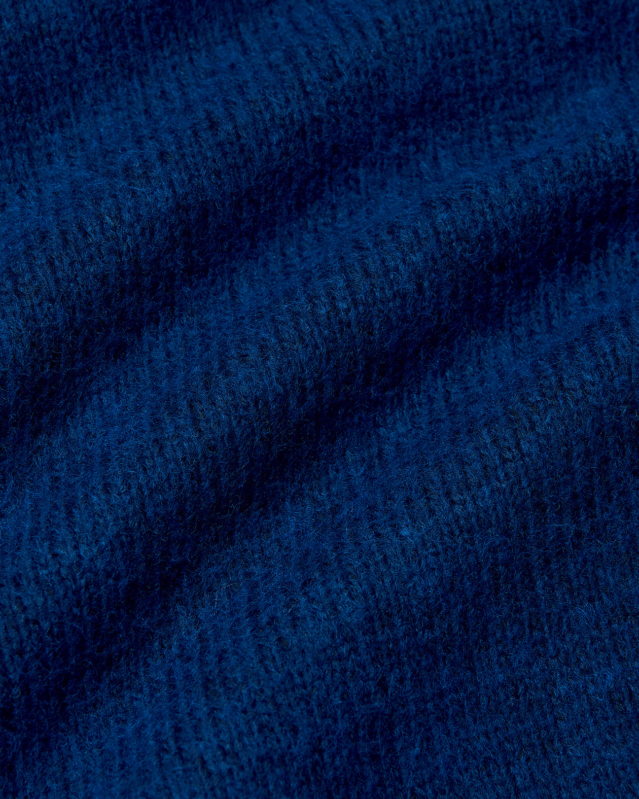 Heather Fiord Marled Crew Neck Sweater showcasing soft, ribbed texture.