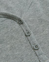 Womens Heather Gray Waffle Long Sleeve Boxy Henley with buttoned placket.