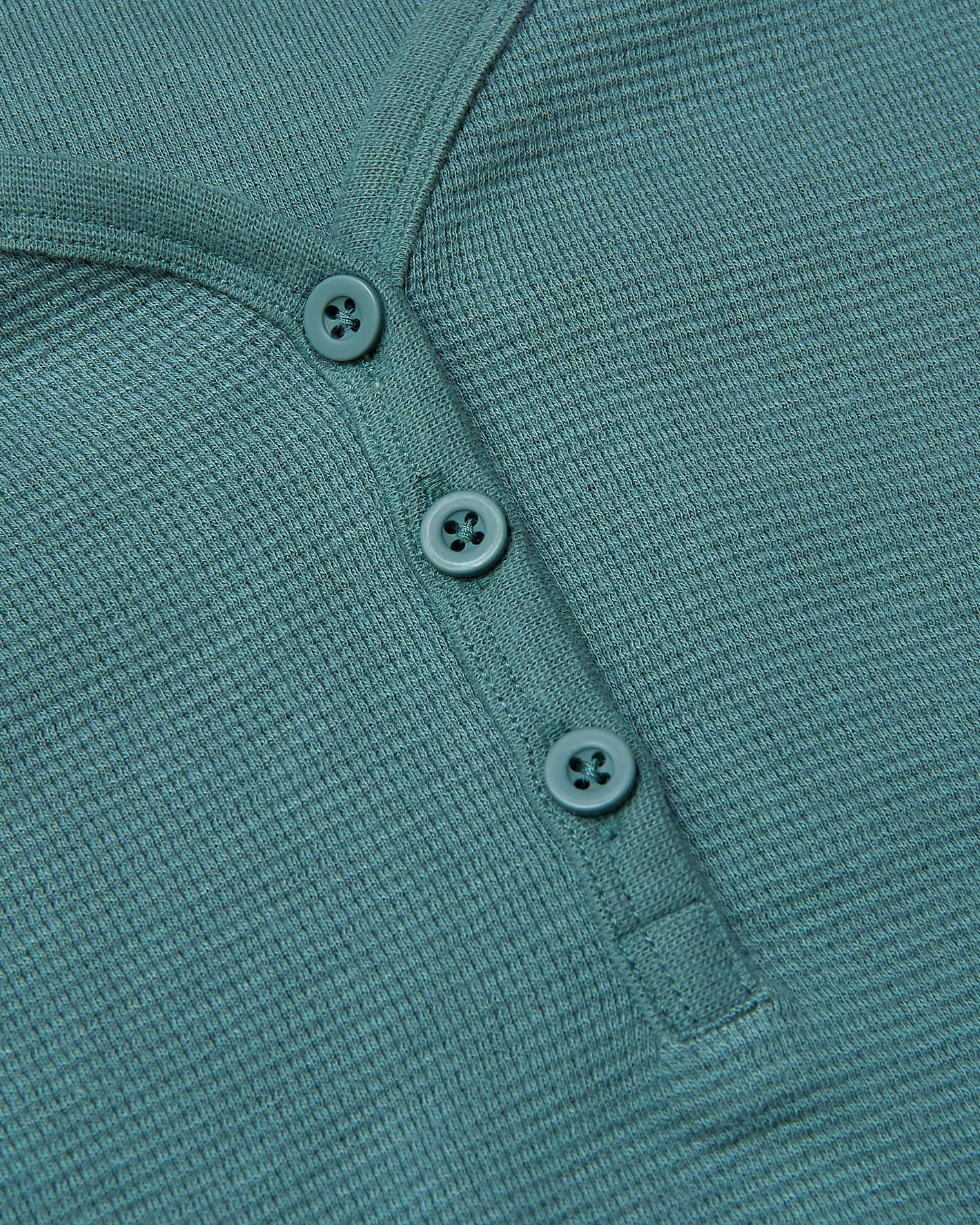 Womens Stormcloud Waffle Long Sleeve Boxy Henley, close-up of buttoned neckline.