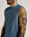 Baltic Sleeveless Active Muscle Tee on tattooed man’s upper body.