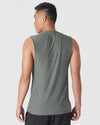 Back view of Heather Forest Sleeveless Active Muscle Tee on model.