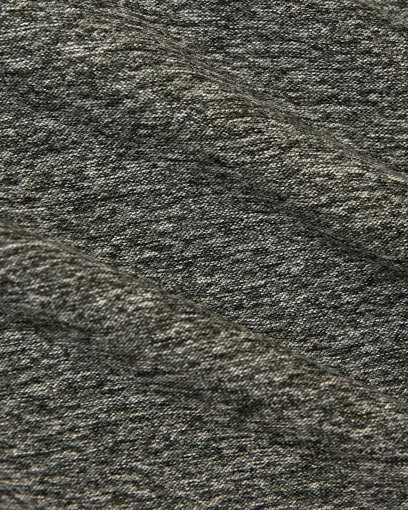 Heather Forest Sleeveless Active Muscle Tee close-up, showcasing soft knit fabric texture.